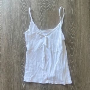 White tank top with cut down the middle and bow on the chest from hollister